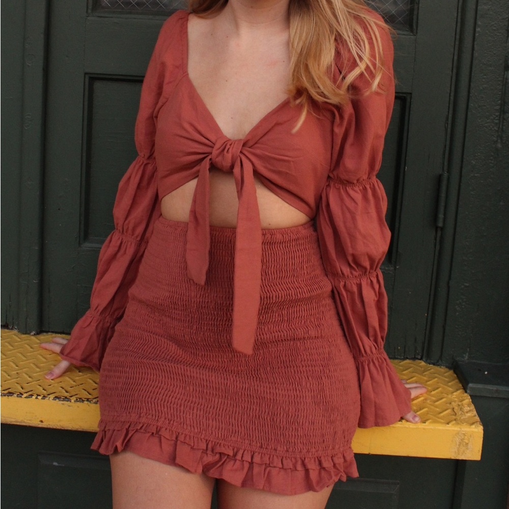 pink ruffled keyhole dress